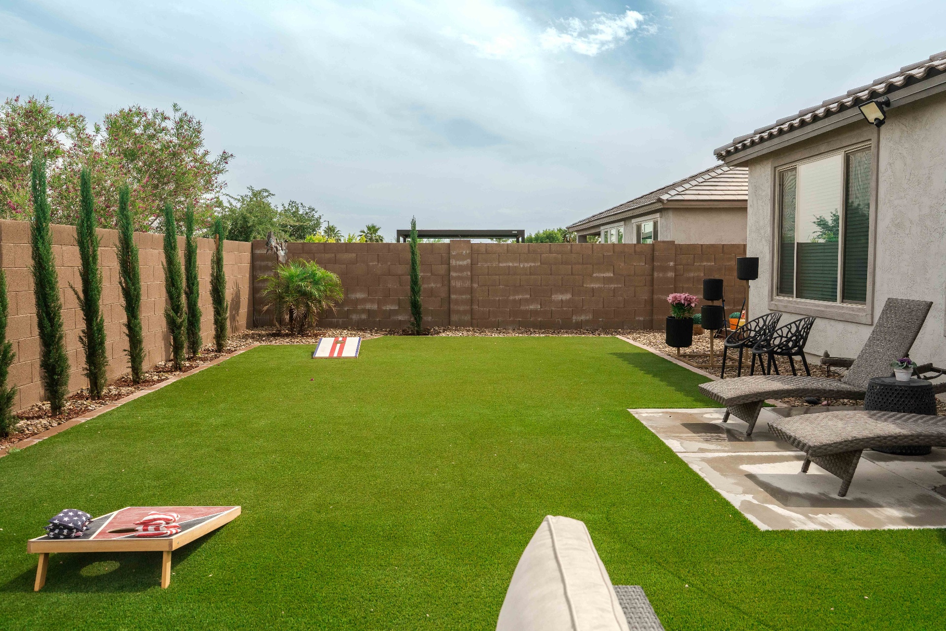 Artificial turf installation in a westside Phoenix backyard by Denali Customs